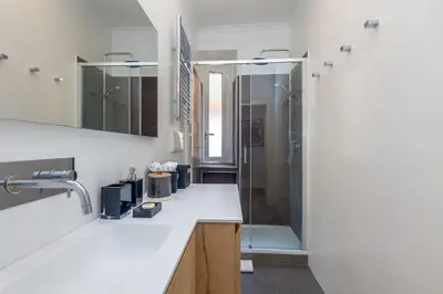 a bathroom with a shower and a sink at S. Cosimato Trastevere in Rome