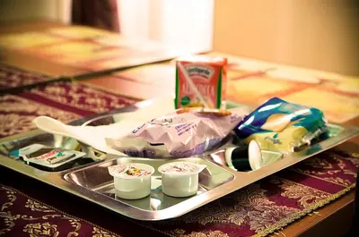 a tray with some food on top of a table at Parioli House in Rome
