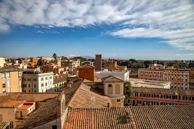 a view of a city from the roofs of buildings at Hotel Colosseum in Rome