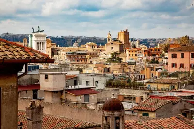 a view of a city with buildings and roofs at Hotel Colosseum in Rome