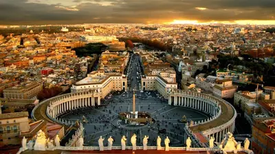 an aerial view of the city of paris at sunset at Hotel Alessandrino in Rome