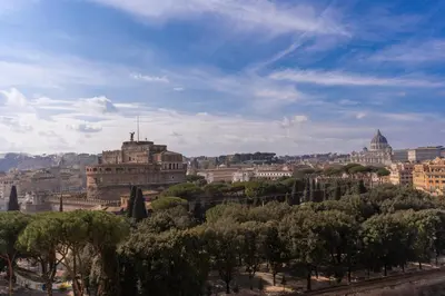 a view of a city with trees and buildings at Roma dei Papi B&B in Rome