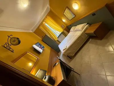 an overhead view of a bedroom with a bed in a room at Viennese Due in Rome