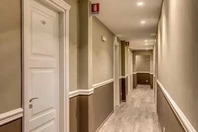 a corridor of a hallway with a door at Residenza Belli Inn in Rome