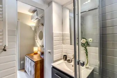 a bathroom with a sink and a shower at RR Apartments San Giovanni in Rome