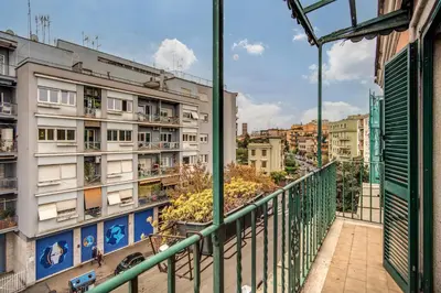 a balcony with a view of a building at RR Apartments San Giovanni in Rome
