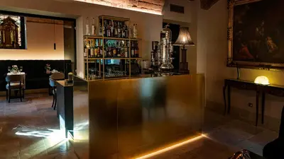 a bar with a wooden counter in a room at Hotel Villa San Pio in Rome