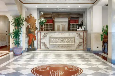 a large room with a tile floor and a fireplace at Hotel Villa San Pio in Rome