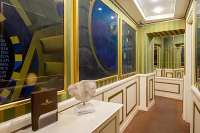 a museum with a sculpture on a table in front of a painting at Residenza Canova Tadolini - Guesthouse in Rome