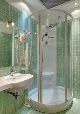 a bathroom with a shower and a sink at Hotel Corot in Rome