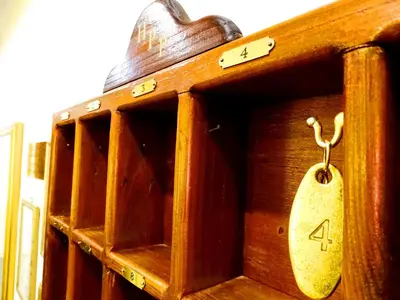 a wooden box with a tag on it at Hotel Porta Pia in Rome