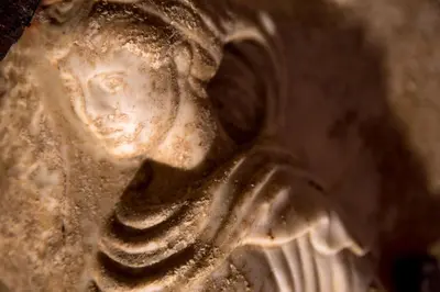 a metal object with a face on it at The Inn at the Roman Forum Luxury Collection - The Inn At The Roman Forum in Rome