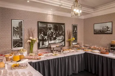 a table with food on it in a room at Albergo Ottocento in Rome