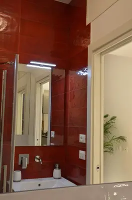 a bathroom with a sink and a mirror at Posada de Liz y Fabrizio in Rome
