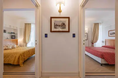 a door leading into a bedroom with a bed at Residenza RomaCentro in Rome