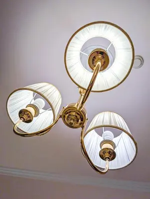 a light fixture with two lights on a ceiling at Hotel Philia in Rome