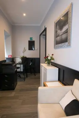 a living room with a couch and a table at Duca d'Alba Hotel - Chateaux & Hotels Collection in Rome