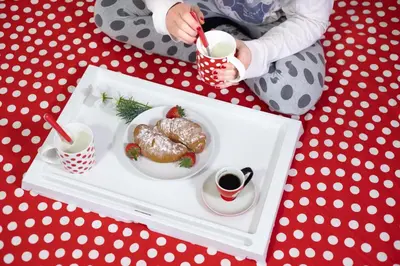 a plate of food on a tray with two cups of coffee at B&B Easy in Rome