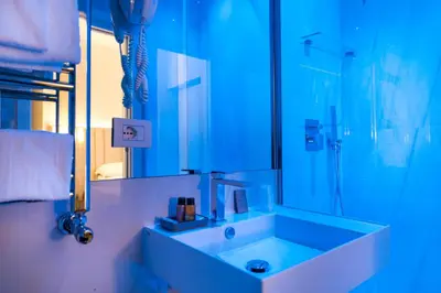 a bathroom with a sink and a shower at Villa Zaccardi in Rome