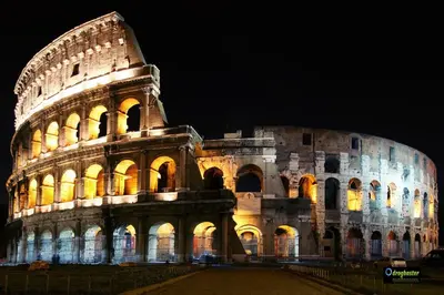 a building that is lit up at night at SuityRHome RioneMonti56 in Rome