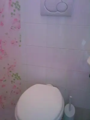 a bathroom with a white toilet in a room at Roma Prince Inn accommodation in Rome