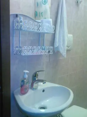 a bathroom with a sink and a toilet at Roma Prince Inn accommodation in Rome