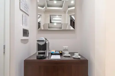 a coffee machine on a counter in a room at Internazionale Domus in Rome