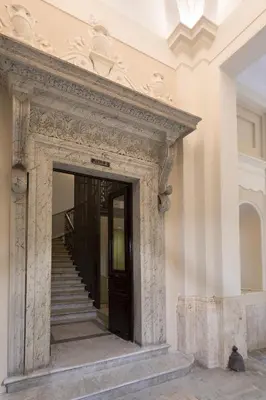 an entrance to a building with a wooden door at Boutique Hotel Galatea in Rome
