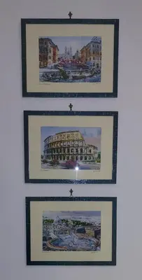 a group of four pictures of a building at Gaia's Room B&B in Rome