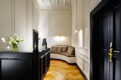 a living room with a couch in a room at Splendor Suite Rome - Suites & Apartments in Rome