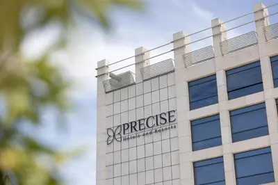 a building with the synergy insurance company logo on it at Precise House Mantegna Roma in Rome