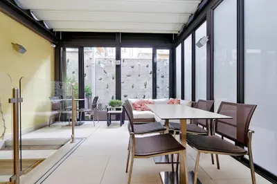 a dining room with a table and chairs at Hotel Camelia in Rome
