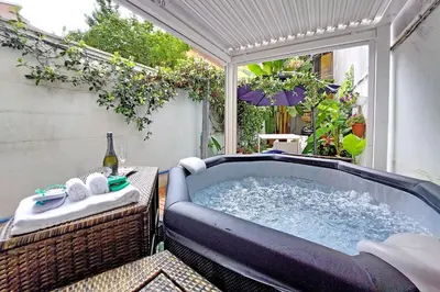 a jacuzzi tub sitting on a patio at Luxury Domus in Rome