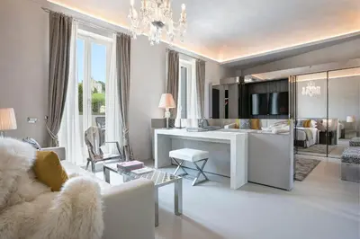 a living room with a couch and a table at Palazzo Nainer in Rome