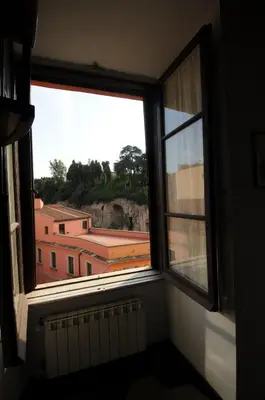 a window in a room with a view at Casa Vacanze Colosseo da Fernando no elevator in Rome