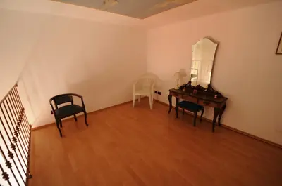 an empty room with a desk and a mirror at Casa Vacanze Colosseo da Fernando no elevator in Rome