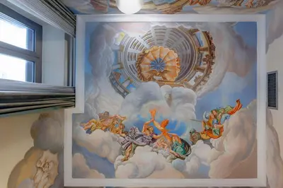 a mural on the ceiling of a room at Hotel Amalfi in Rome