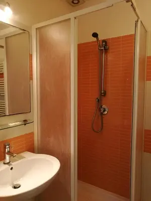 a bathroom with a sink and a shower at Serendipity in Rome