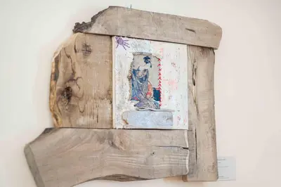 a wooden frame with a picture on a wall at Casa De' Fiori in Rome