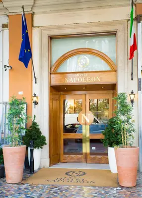 a front door to a napolioren building at Hotel Napoleon in Rome
