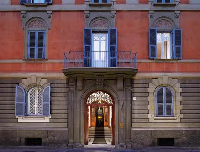 an entrance to a building with a balcony at San Pietro Boutique Rooms in Rome
