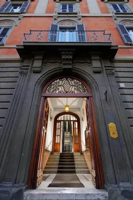 an entrance to a building with two doors and stairs at San Pietro Boutique Rooms in Rome
