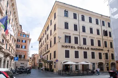 a hotel building with a hotel delle nations sign on it at Hotel Delle Nazioni in Rome