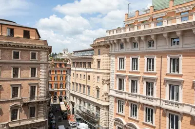 a group of tall buildings in a city at Hotel Delle Nazioni in Rome