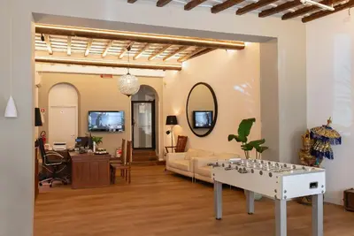 a living room with a couch and a table at Hotel Elite in Rome