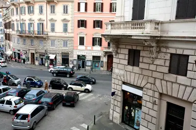 a view of a city street with cars parked at Rome Holiday Home in Rome