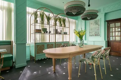 a dining room with a table and chairs at Hotel Degli Aranci in Rome