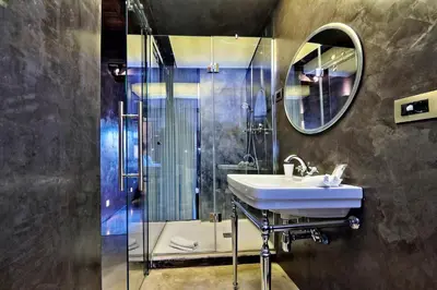 a bathroom with a sink and a shower at Mama's Home Rome in Rome