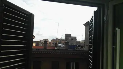 a view of a city from a window at Affittacamere Tiburstation in Rome