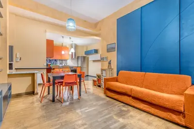 a living room with a couch and a table at Il gazebo a Monteverde in Rome